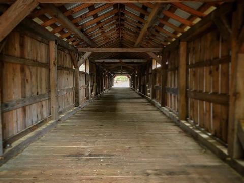 The longest covered bridge in North Carolina stretches 140 feet long. It's part of the Ole Gilliam Mill Park in Sanford. 