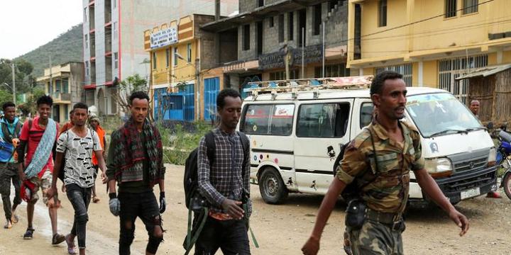 [File Image] : Newly recruited youth joining Tigrayan forces march through the village of Nebelet, northern Tigray, Ethiopia.