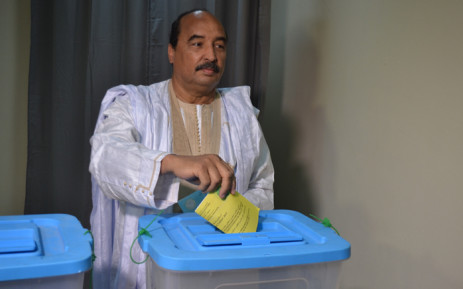 FILE: Former President Mohamed Ould Abdel Aziz of Mauritanian casts his vote in the country’s constitutional referendum on 5 August 2017 at the polling station in Nouakchott. Picture: AFP