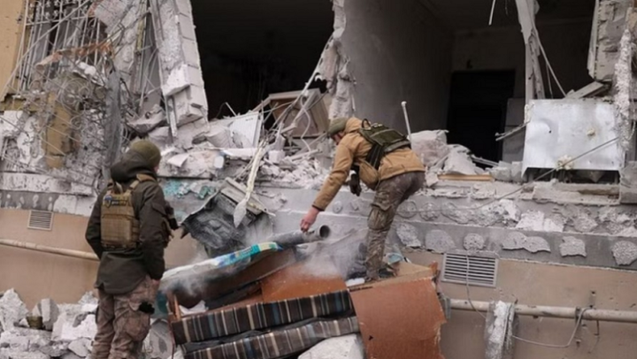 Ukrainian servicemen remove a grad rocket in a damaged house after an attack, amid Russia's invasion of Ukraine, in Kherson, Ukraine January 29, 2023. REUTERSUkrainian servicemen remove a grad rocket in a damaged house after an attack, amid Russia's invasion of Ukraine, in Kherson, Ukraine January 29, 2023.