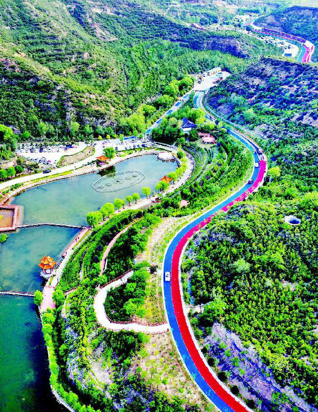 太原东西山旅游公路成为绿色路致富路双语