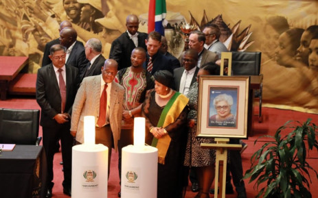 Members of Parliament during a candlelight ceremony to honour the life  of the late Dr Frene Ginwala, the founding Speaker of the National Assembly in democratic South Africa. Picture: @ParliamentofRSA/Twitter.