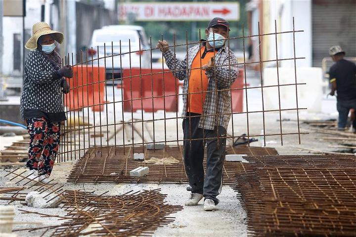 批外劳医检公司未与业者商量 雇联促暂缓调高外劳体检费_马来西亚_新闻_华人头条