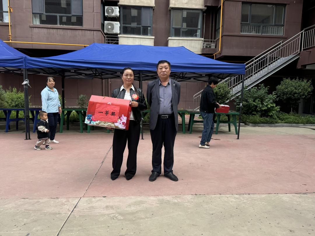 金沙路街道福利路社区在小区举办“微’服务传佳节 粽叶飘‘格’外香”的项目活动