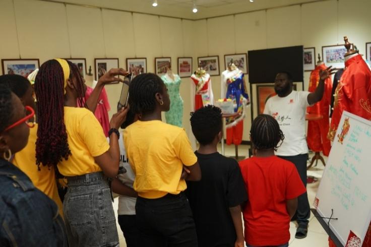 A group of people standing in a room