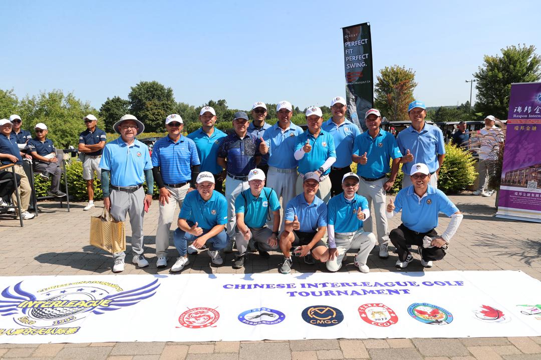 A group of men posing for a photoDescription automatically generated