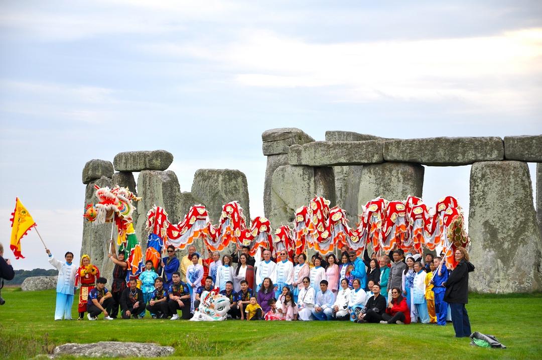 A group of people posing for a photo

Description automatically generated