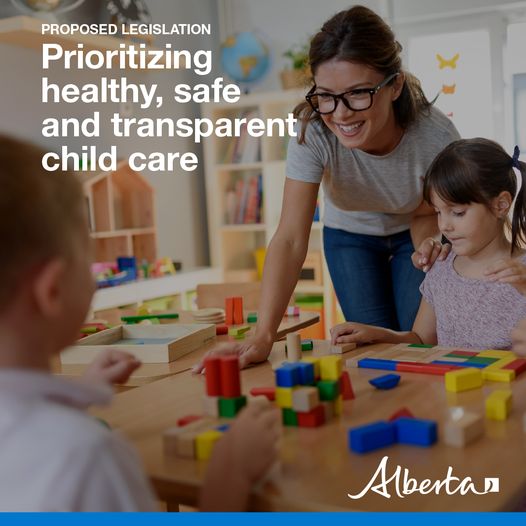 A child care educator stands near a table as two children are playing with blocks. Text reads Proposed legislation: Prioritizing healthy, safe and transparent child care. The Alberta government logo is in the bottom right corner.