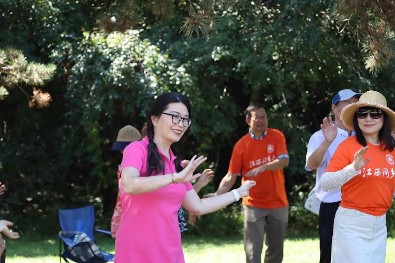 A group of people standing outsideAI-generated content may be incorrect.