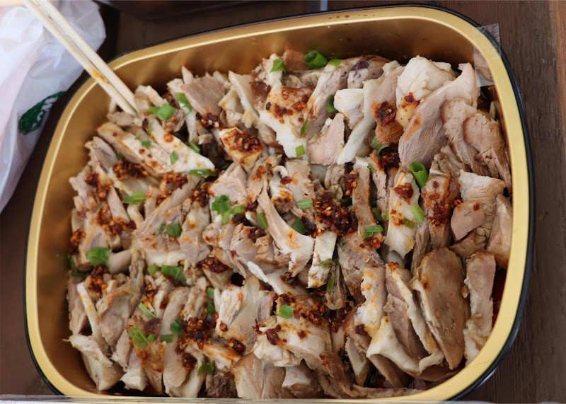 A tray of food with a forkAI-generated content may be incorrect.