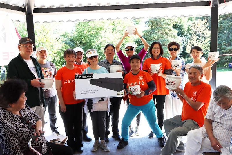 A group of people holding white cupsAI-generated content may be incorrect.