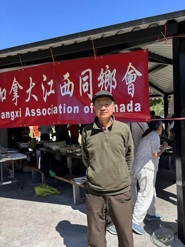 A person standing in front of a red bannerAI-generated content may be incorrect.