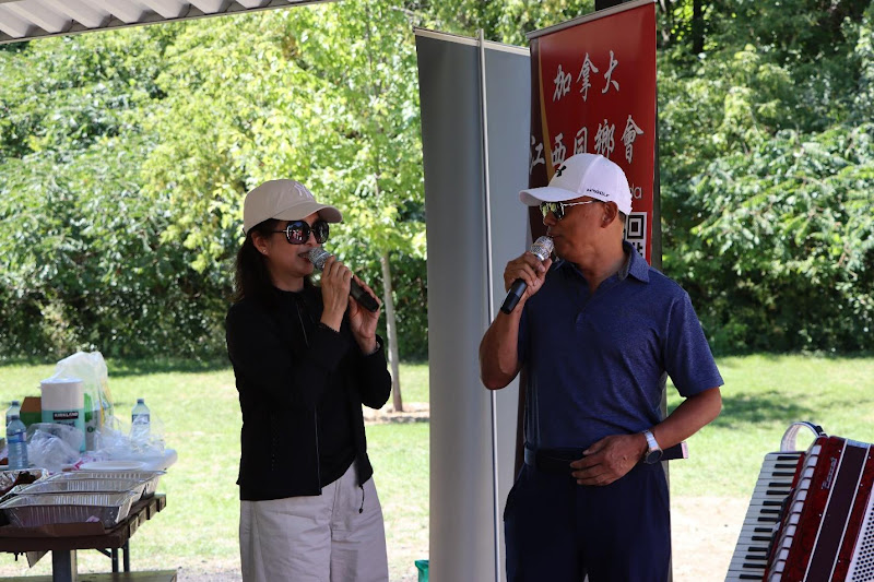 A person and person singing into microphonesAI-generated content may be incorrect.