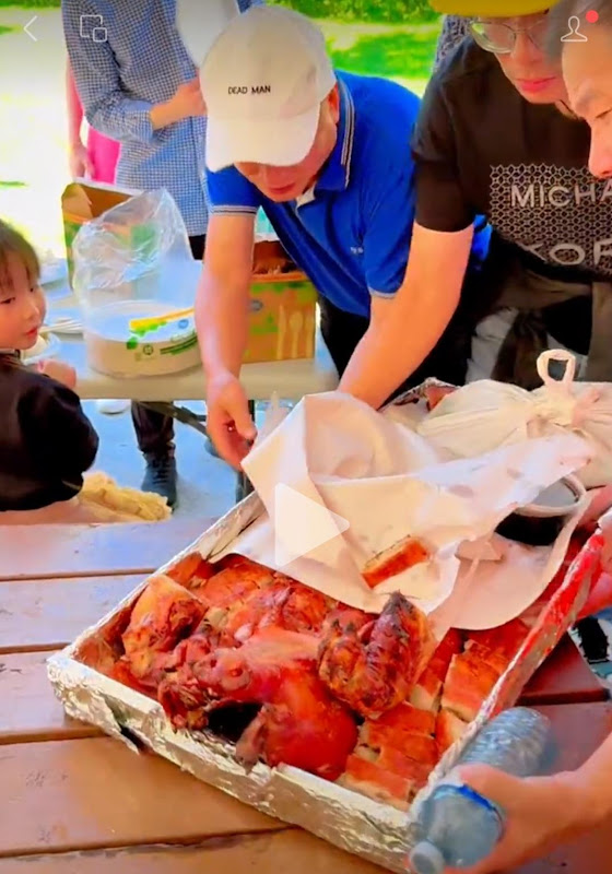 A group of people at a picnic tableAI-generated content may be incorrect.