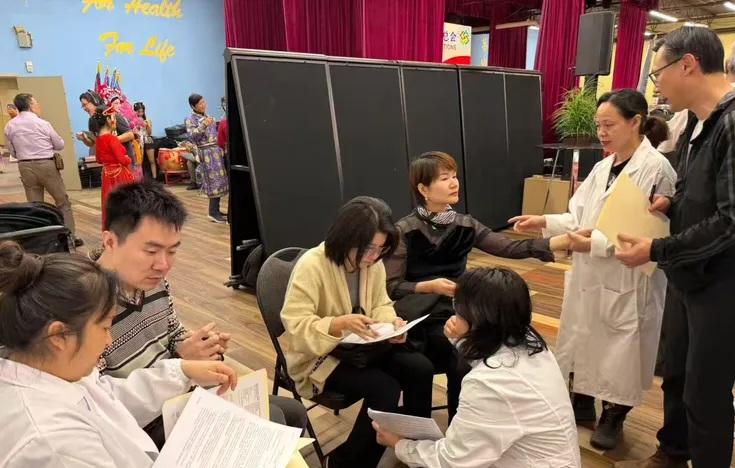 A group of people sitting in a circle AI-generated content may be incorrect.