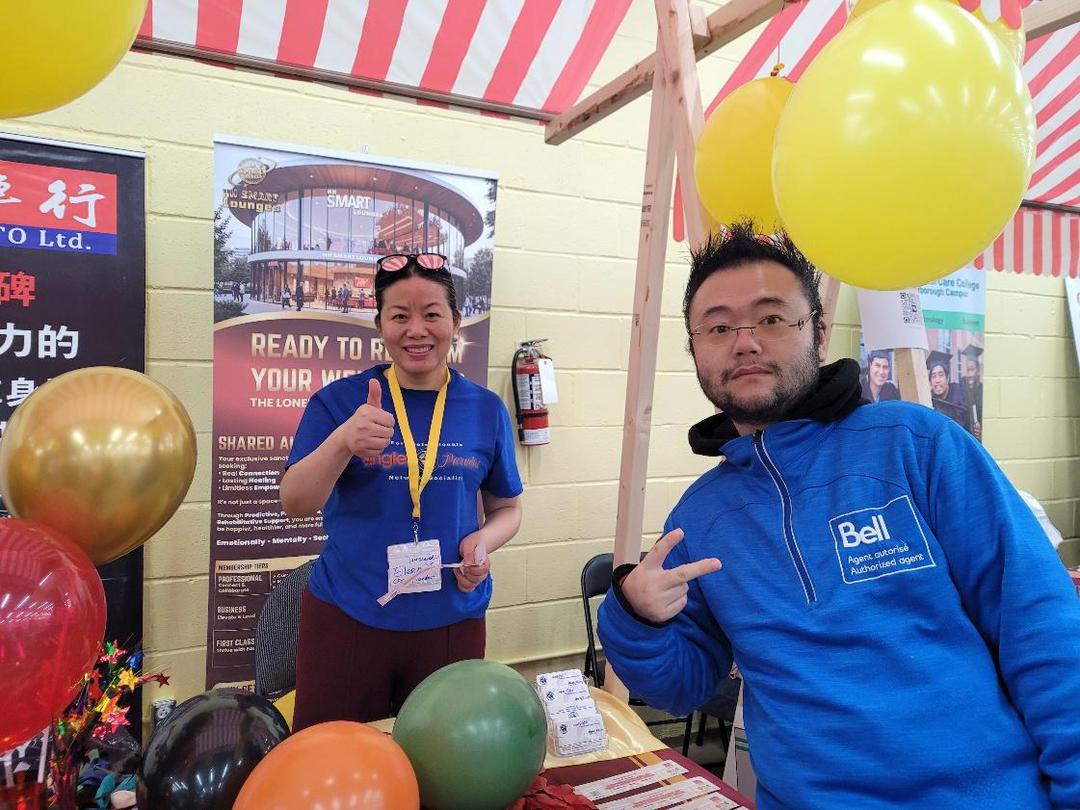 A person and person standing next to balloons AI-generated content may be incorrect.