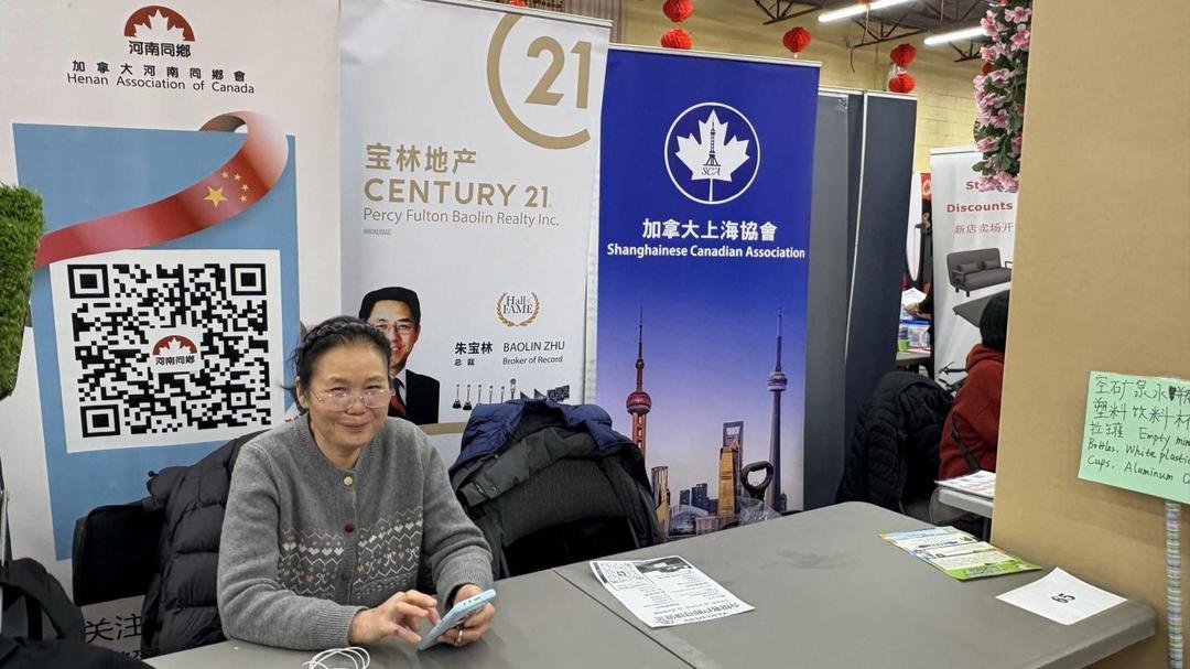 A person sitting at a table AI-generated content may be incorrect.