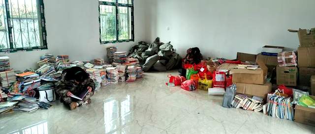 国旗下的誓言：寒日开阳，24700册图书筑起乡村孩子温暖书乡