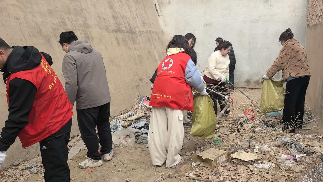 榆阳区崇文路街道春苑社区开展“学雷锋”环境卫生整治志愿服务活动