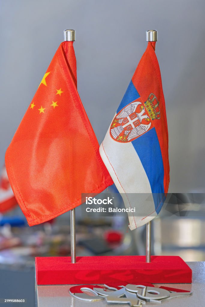 China Serbia Desk Flags People Republic of China and National Flag of Serbia at Conference Table 2023 Stock Photo